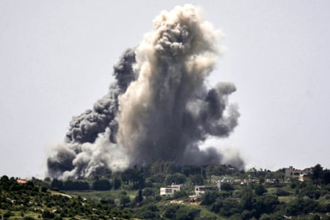 Smoke plumes erupt during Israeli bombardment on the village of Alma al-Shaab in south Lebanon on 25 April.