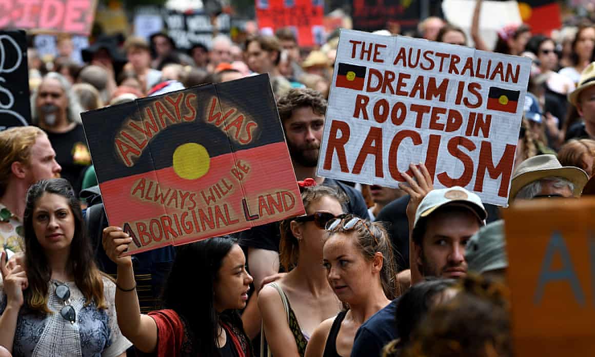 Protesters march during the Invasion Day rally in Melbourne, Australia, 26 January 2020.