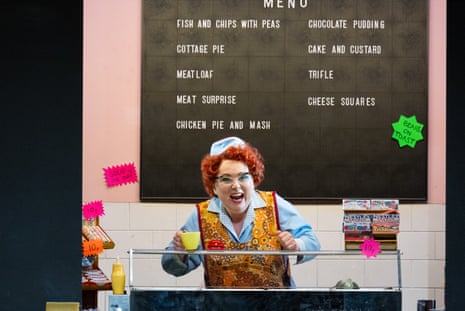 Rebecca Evans as Despina in Cosi fan Tutte at Wales Millennium Centre, Cardiff. Evans is a canteen assistant behind a cafe counter