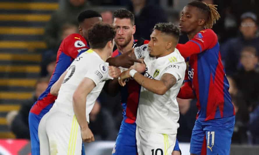 The players clash after a poor tackle from Leeds United Welsh midfielder Daniel James (L)