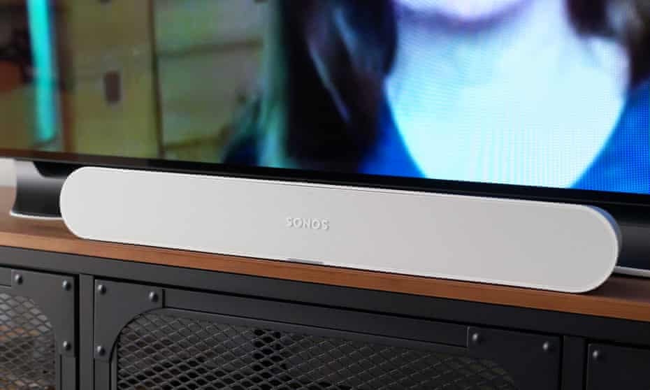 Sonos Ray soundbar review pictured sitting on a cabinet in front of a TV.