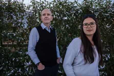 A man and a young woman in a garden