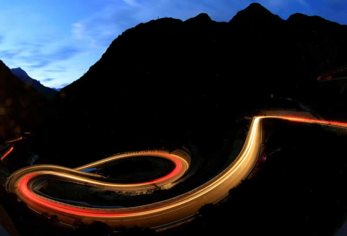A road leading into the distance in some mountains.