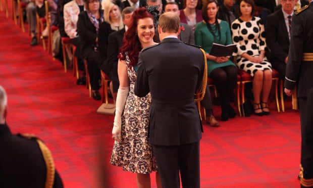Devon being made an MBE by Prince William last year.