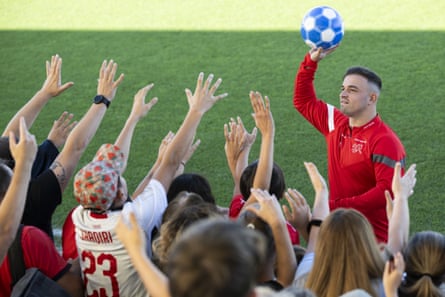 Swiss international Xherdan Shaqiri interacts with supporters during a training session in preparation for the European Qualifiers 2024 against Belarus in October 2023.