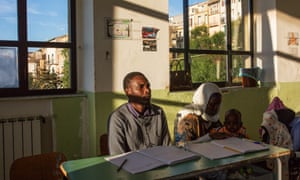 Families from Mali and Nigeria at school in Sutera, learning the Italian language.