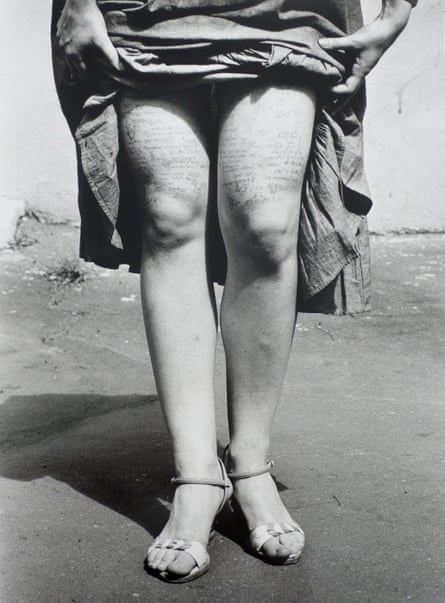 A young woman with crib notes on her thighs, photographed by Valerie Khristoforov in Moscow in 1984.