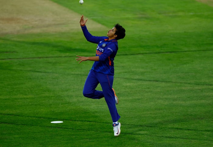 India's Shafali Verma celebrates taking a catch to dismiss England's Alice Capsey.