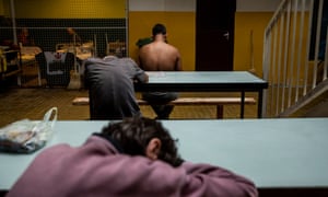 Homeless people in a Budapest shelter.