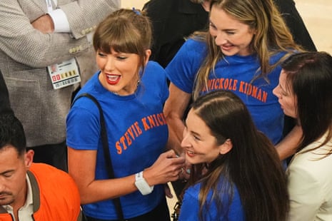 Taylor Swift attends Game 4 of the NBA finals along with Alana and Este Haim.
