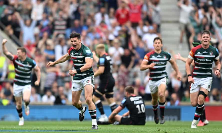 Freddie Burns (second left) celebrates after seeing his winning drop goal sail over.
