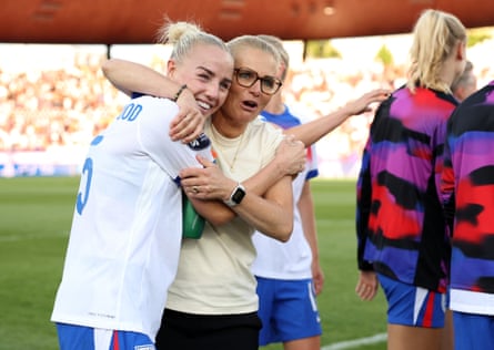 Sarina Wiegman embraces Alex Greenwood at full time