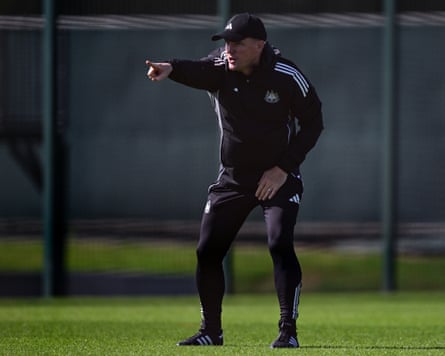 The Newcastle manager, Eddie Howe, points as he gives instructions during a training session.