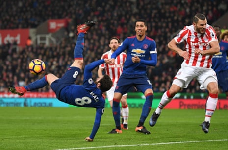 Juan Mata attempts an overhead kick.