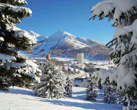 Overview of the snow-covered alpine village of Sestrier