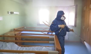 A Russian servicemen disinfects Schilpario retirement home in Lombardy, Italy.