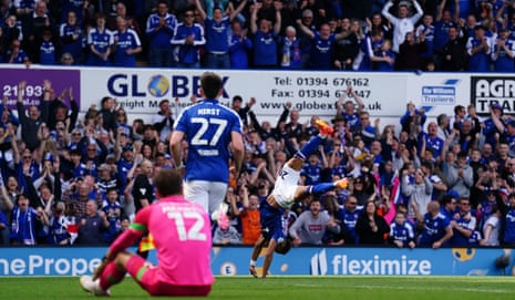 Omari Hutchinson of Ipswich Town (second left) celebrates scoring their second goal against Huddersfield Town at Portman Road.