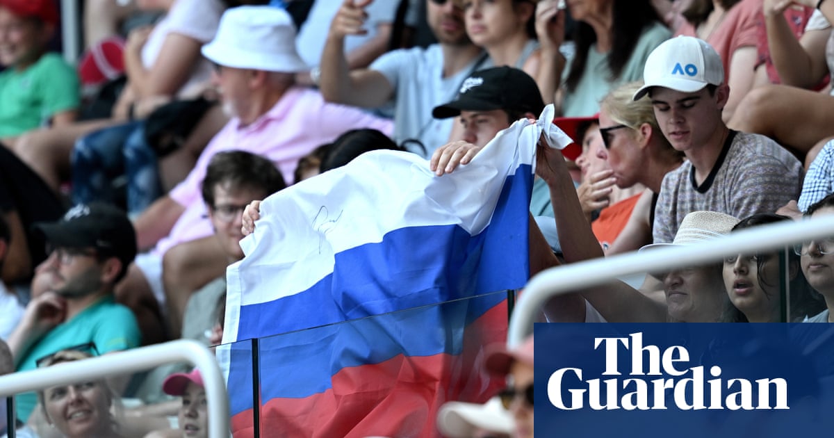 Tennis fans seen hoisting Russian flag at Australian Open despite ban