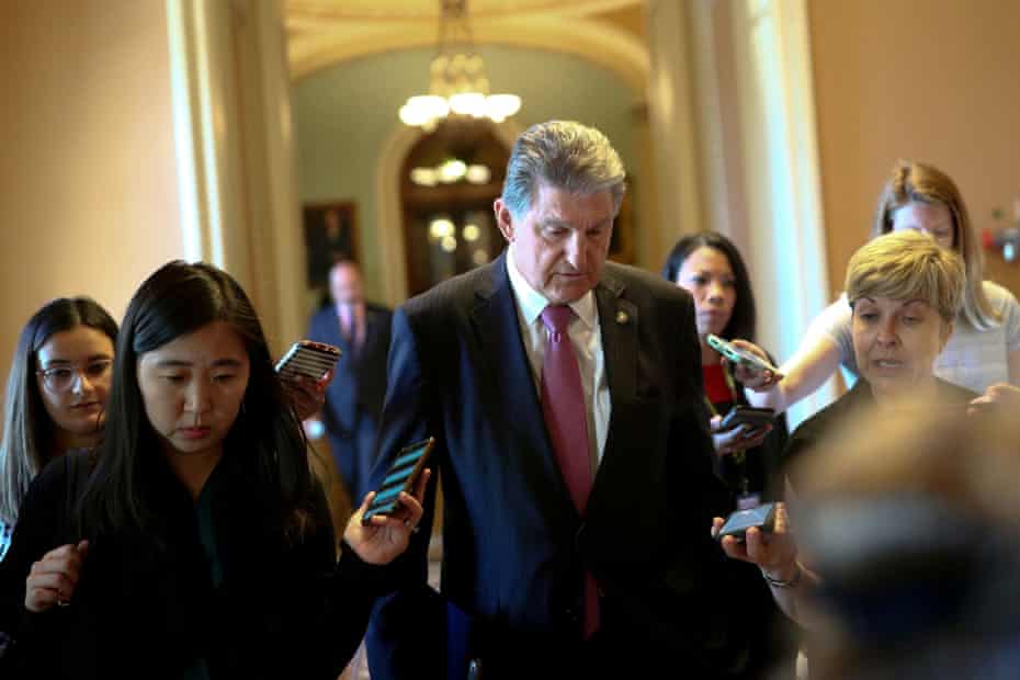 West Virginia Democrat Senator Joe Manchin speaks to reporters before attending an infrastructure meeting on Capitol Hill.