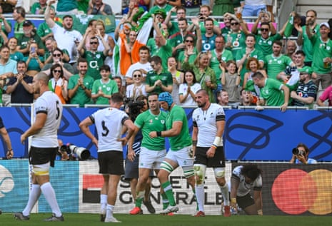 Tadhg Beirne of Ireland celebrates with James Lowe (left) after scoring their side's third try against Romania.