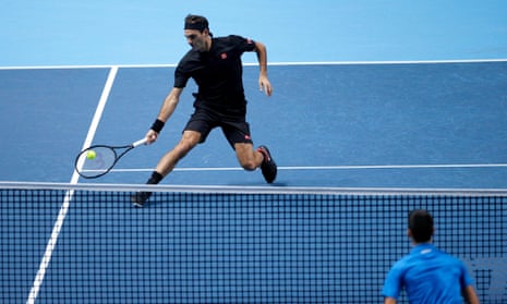 Roger Federer in action against Novak Djokovic.