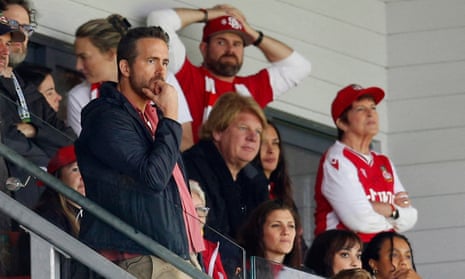 Ryan Reynolds looks on nervously at the match from the stands at Wrexham FC