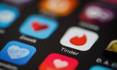 The Tinder app logo on a mobile phone screen