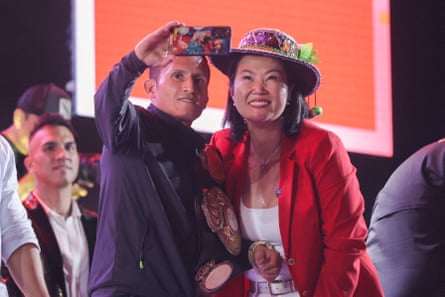 Keiko Fujimori does a selfie at an election rally