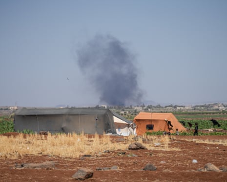 Smoke rises from fires in areas controlled by Druze factions in Syria’s Sweida countryside in July last year