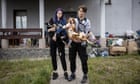 'We had too much to do to be scared': the couple who fled Irpin with 19 dogs