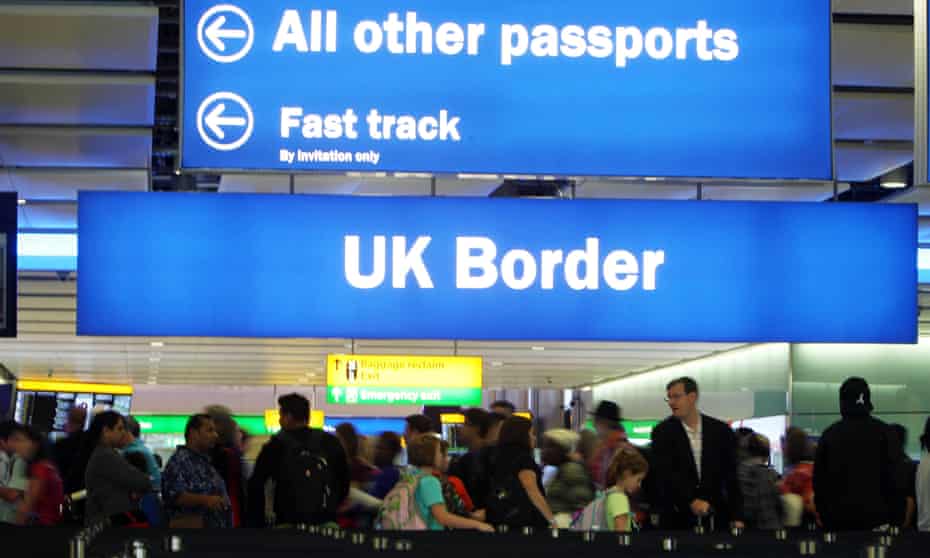 passengers going through the UK Border at Terminal 2 of Heathrow Airport.
