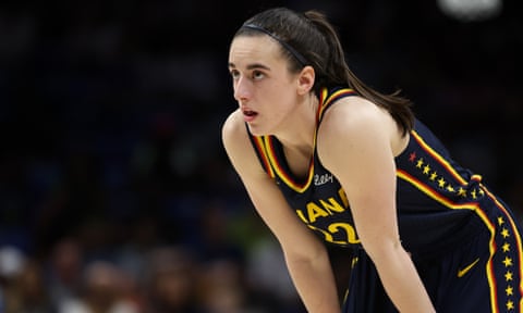 Caitlin Clark of the Indiana Fever looks on during a preseason game against the Dallas Wings on Friday in Arlington, Texas.