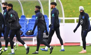 Joe Gomez, second left, and Raheem Sterling, right, in training on Tuesday.