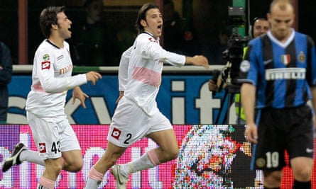 Palermo's Christian Zaccardo (center) celebrates with team-mate Andrea Barzagli after scoring a goal against Internazionale in April 2007.