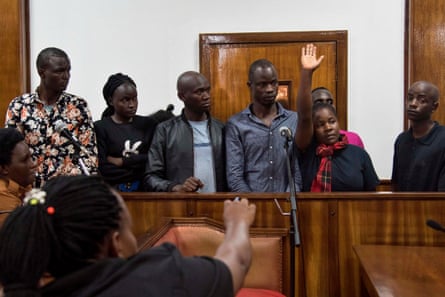 Members of Uganda’s LGBT community appear in court after 125 people were arrested at a gay-friendly bar in Kampala, November 2019.