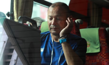 Eddie Jones sits on the team bus after the announcement of the cancellation of their match against France.