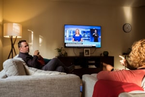Gavin and Trisha Balharrie discuss news on the coronavirus using sign language and the assistance of an on-screen Auslan translator onscreen.