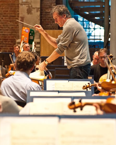 George Fenton rehearsing with the Royal Philharmonic Orchestra for a concert for CARE International in London, 2010.