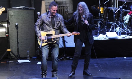 Bruce Springsteen and Patti Smith perform after a screening of Horses: Patti Smith and Her Band at the Beacon Theatre on 23 April.