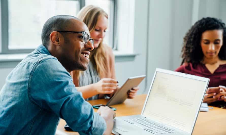 Business people using technology in meeting