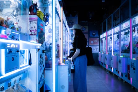 People playing claw machines in Kwai Chung Plaza, Hong Kong, on 19 July 2026.