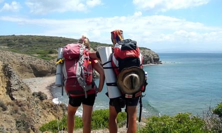 two hikers on coastal path