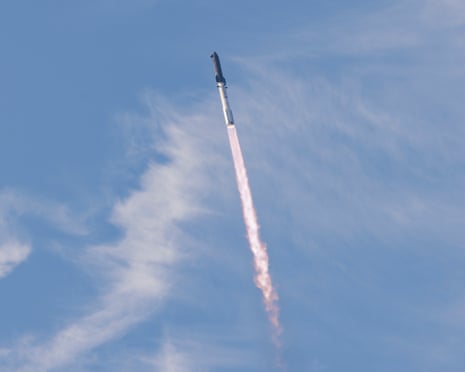 Rocket heading upwards against blue sky