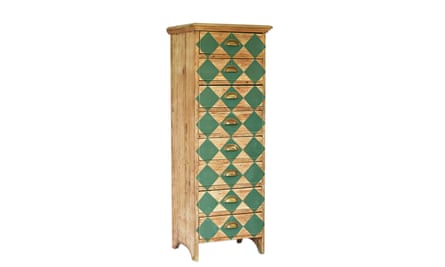 A tall wooden chest of drawers painted with Green diamonds, from Vinterior’s collaboration with Farrow & Ball