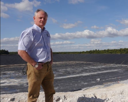 Andrew Blenkiron, managing director of the Elveden estate in Suffolk, next to a new reservoir called Summerpit.