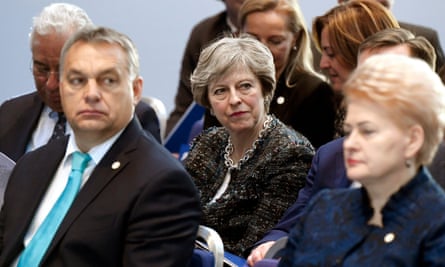 Theresa May (centre) sits behind the Hungarian PM, Viktor Orbán, and the Lithuanian president, Dalia Grybauskaitė, in Gothenburg