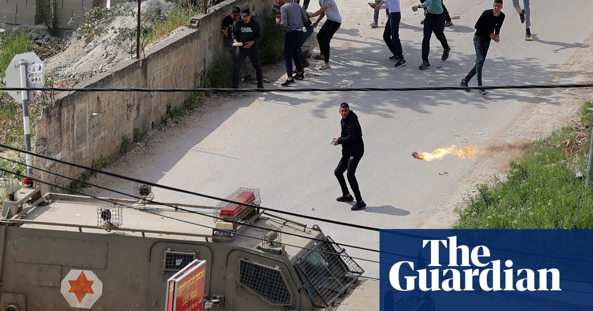 Israeli troops raid town of Palestinian gunman who killed three in Tel Aviv