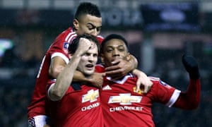 Blind celebrates with teammates after putting United back in front.