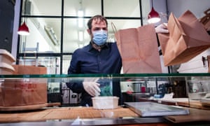 Stefano Tedesco, one of the owners of the Naturale restaurant, prepares and delivers home made-to-order meals in Rome, Italy