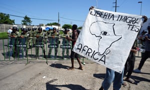 African migrants protest outside the Siglo XXI migrants detention center, demanding Mexican authorities to speed up visas that would enable them to cross Mexico to the US.